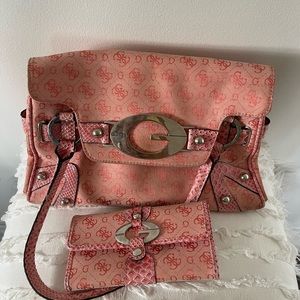 Pink/Peachy Guess purse with matching wallet.